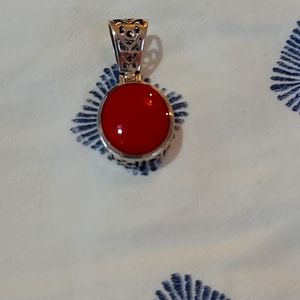 Red Silpada pendant set in filgreed silver